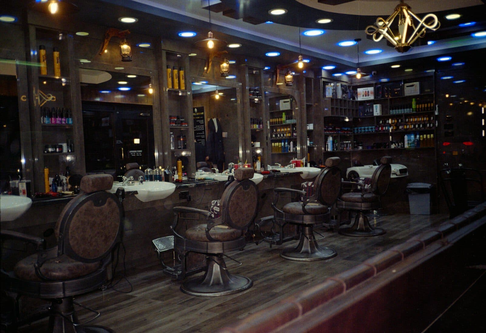 Moody barbershop interior with vintage chairs